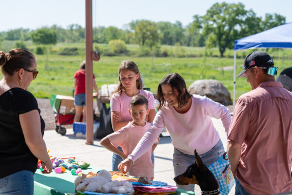 _A745163 Family enjoying a sunny day at a community market