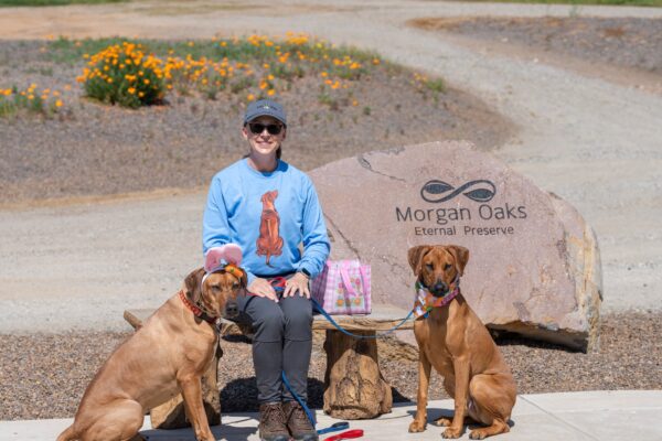 _A745348 Woman with two dogs at Morgan Oaks Eternal Preserve